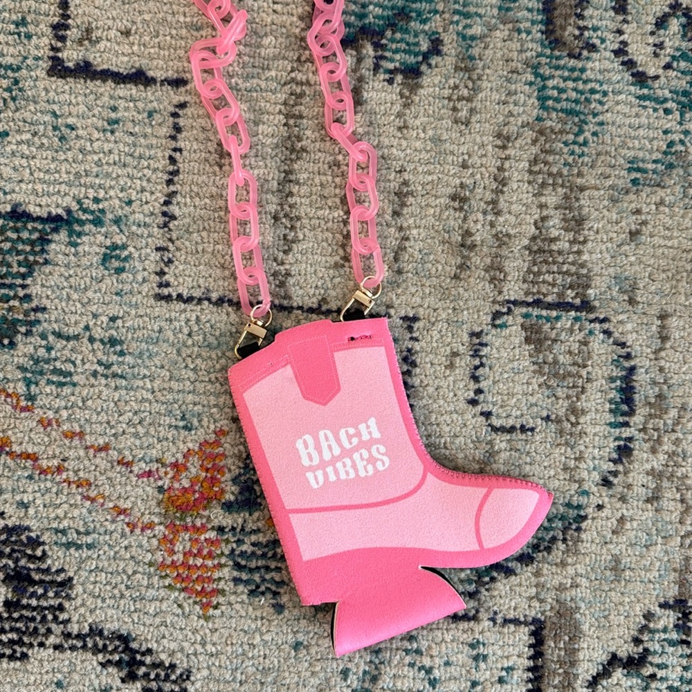 A fun bachelorette gift that wraps around your neck and holds a skinny can!